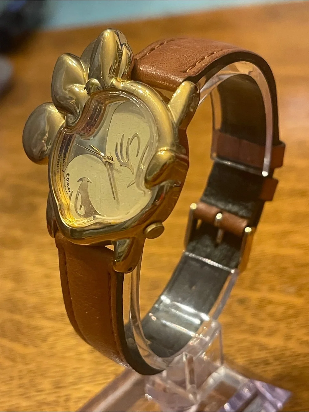 Vintage Lorus Minnie Mouse character watch featuring a distinct gold-tone Minnie